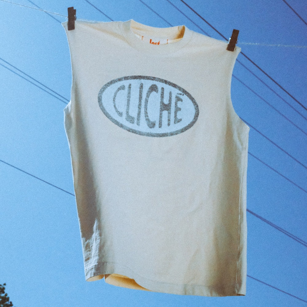 cliché cream cut off tank editorial 