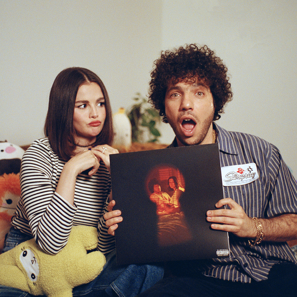 Selena and Benny holding I Said I Love You First (Candy Cane Red LP) Alt